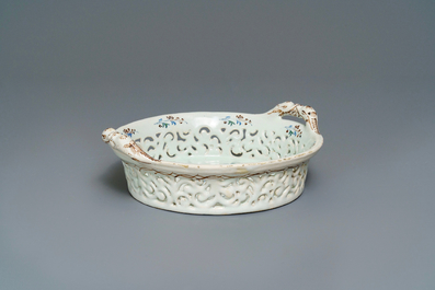 A polychrome Brussels faience '&agrave; la haie fleurie' reticulated basket, 18th C.